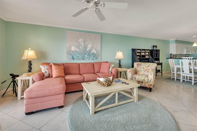 living area featuring crown molding and a textured ceiling