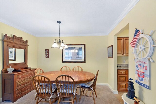 dining room with light carpet, an inviting chandelier, and crown molding