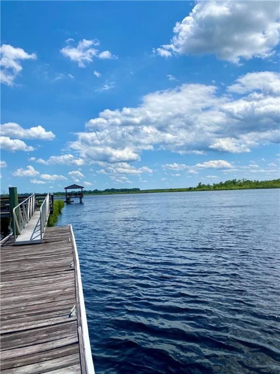 dock area featuring a water view