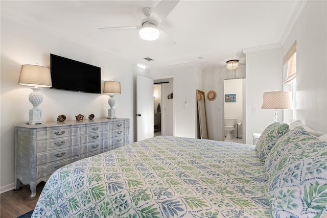 bedroom featuring ornamental molding, wood finished floors, connected bathroom, and a ceiling fan