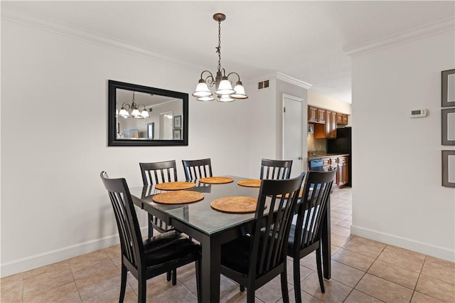 dining room featuring light tile patterned flooring, crown molding, and a chandelier