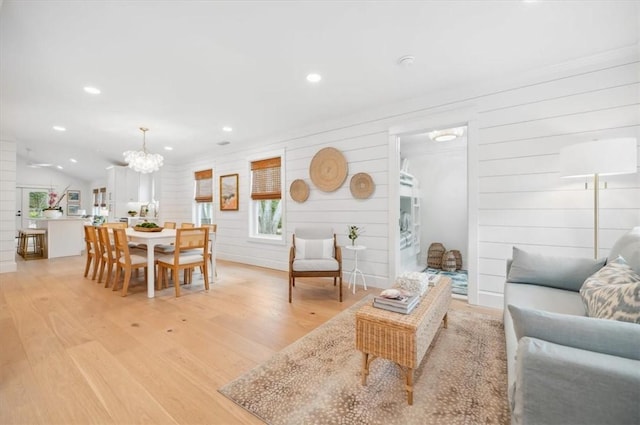 301 Kelsall Ave, Saint Simons Island, GA 31522 - living room featuring light wood-style floors, a chandelier, and recessed lighting