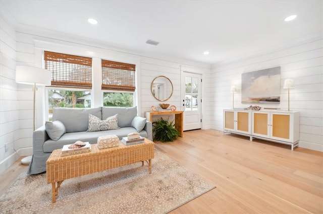301 Kelsall Ave, Saint Simons Island, GA 31522 - living area featuring wood finished floors, wood walls, and recessed lighting
