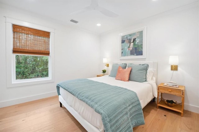 301 Kelsall Ave, Saint Simons Island, GA 31522 - bedroom with light wood finished floors, recessed lighting, and a ceiling fan