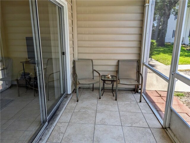 unfurnished sunroom featuring plenty of natural light