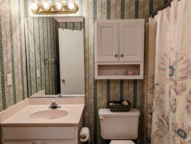 bathroom with vanity and toilet