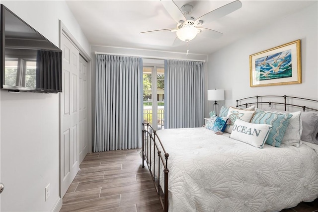 bedroom with ceiling fan, a closet, and access to exterior