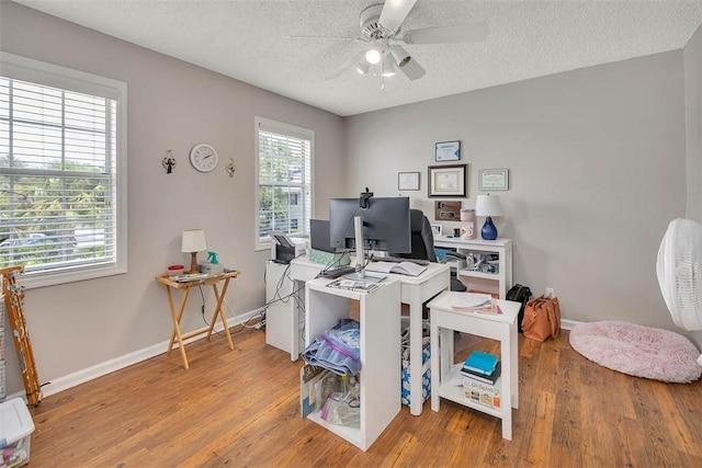 132 S Island Square Dr, Saint Simons Island, GA 31522 - office featuring a ceiling fan, wood finished floors, and a textured ceiling
