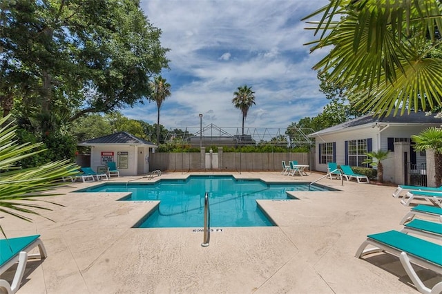 132 S Island Square Dr, Saint Simons Island, GA 31522 - community pool featuring a patio and an outbuilding