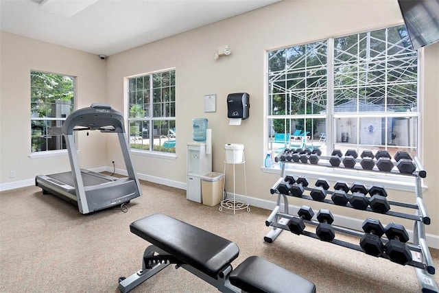 132 S Island Square Dr, Saint Simons Island, GA 31522 - gym featuring healthy amount of natural light and carpet