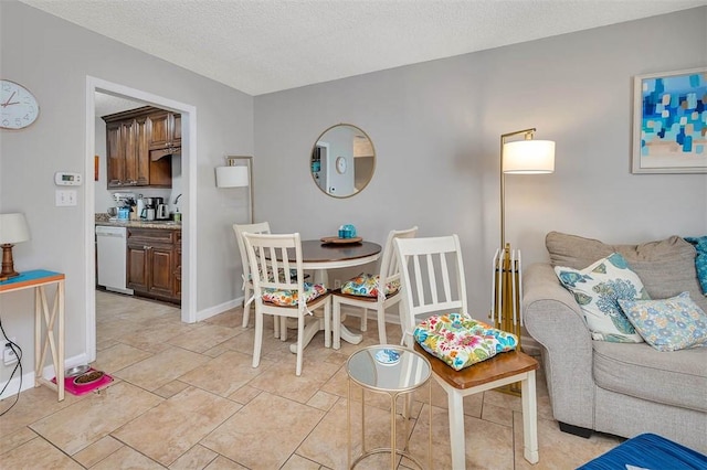 132 S Island Square Dr, Saint Simons Island, GA 31522 - dining room with a textured ceiling