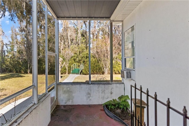 unfurnished sunroom featuring cooling unit