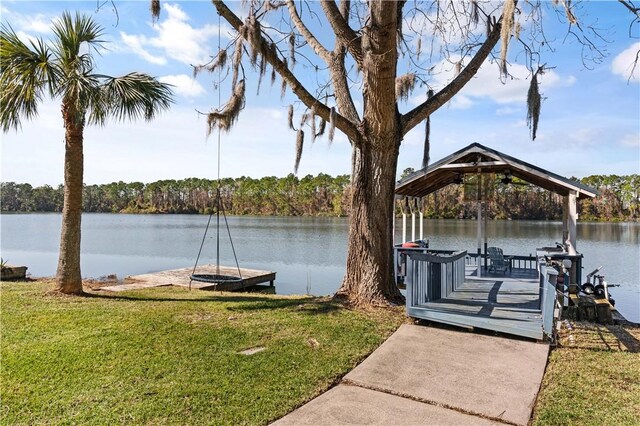 dock area featuring a gazebo and a water view