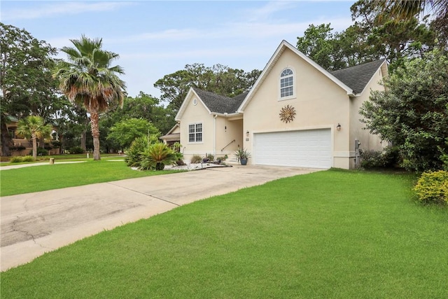 11 Niblick Ct, Saint Simons Island, GA 31522 - traditional home featuring a garage, concrete driveway, stucco siding, and a front yard