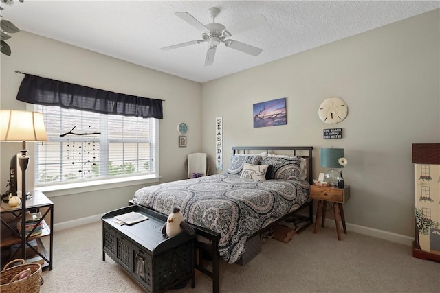 11 Niblick Ct, Saint Simons Island, GA 31522 - carpeted bedroom with baseboards and a ceiling fan