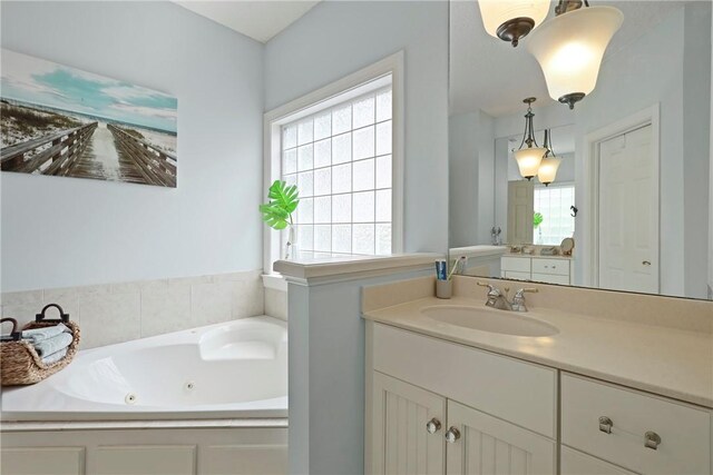 11 Niblick Ct, Saint Simons Island, GA 31522 - bathroom featuring vanity and a whirlpool tub