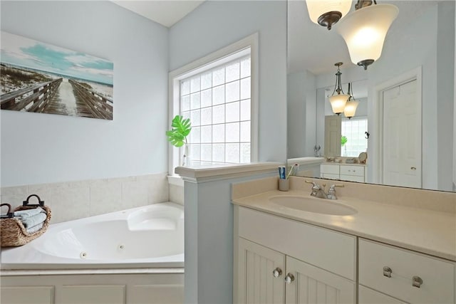11 Niblick Ct, Saint Simons Island, GA 31522 - bathroom with vanity and a jetted tub