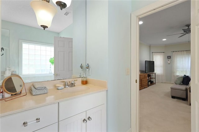 11 Niblick Ct, Saint Simons Island, GA 31522 - bathroom with vanity, ceiling fan, and recessed lighting