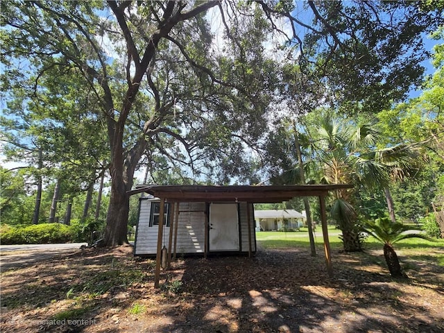 554 Blythe Island Dr, Brunswick, GA 31523 - view of shed with a carport