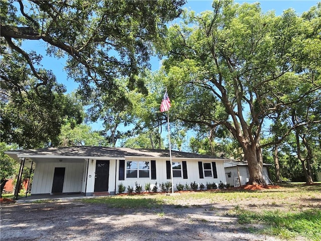 554 Blythe Island Dr, Brunswick, GA 31523 - ranch-style home with driveway and an attached carport