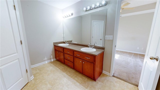 bathroom with vanity and ceiling fan