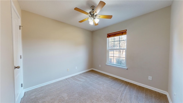 empty room with carpet and ceiling fan