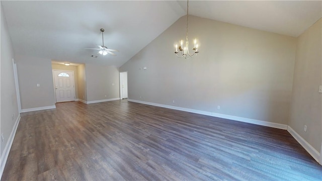 unfurnished living room with dark wood-type flooring, high vaulted ceiling, and ceiling fan with notable chandelier