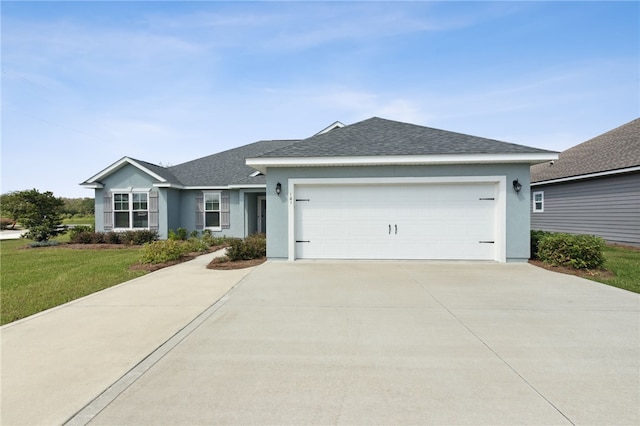 single story home featuring a front yard and a garage