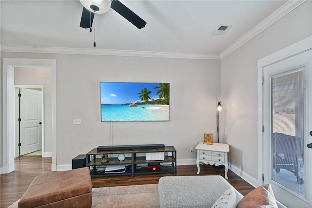 living room featuring wood-type flooring, ornamental molding, and ceiling fan