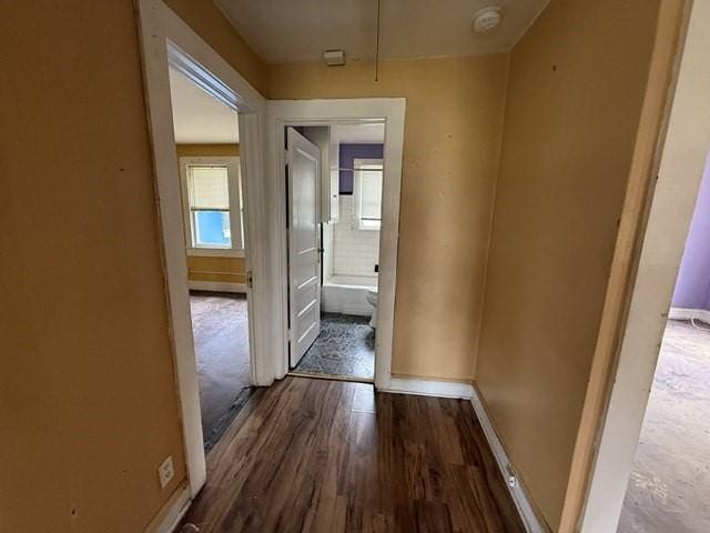 511 Riverside Dr, Waycross, GA 31501 - hallway featuring baseboards and wood finished floors