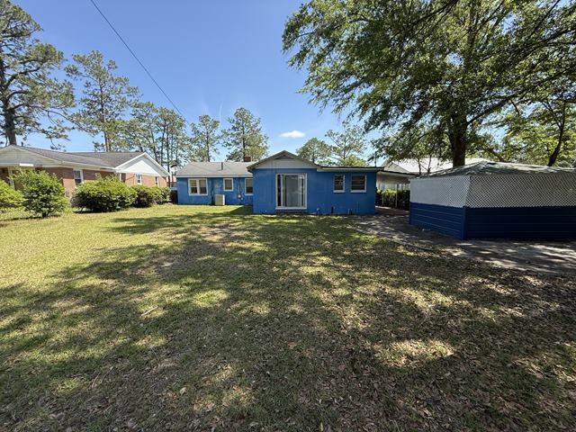 511 Riverside Dr, Waycross, GA 31501 - rear view of house with a lawn