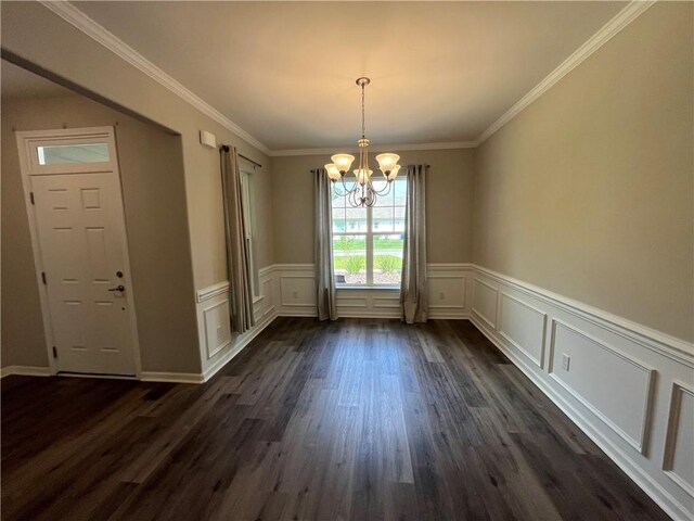 carpeted empty room with ceiling fan, crown molding, and a raised ceiling