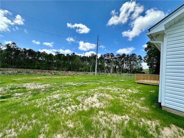 view of yard featuring a deck
