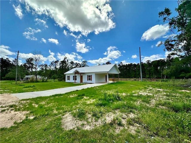 view of yard featuring an attached carport