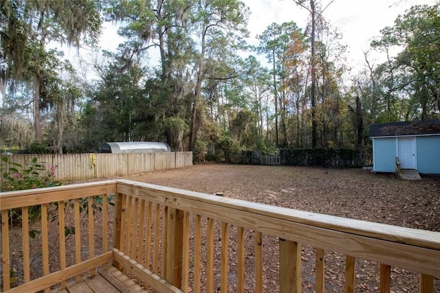 wooden deck with a shed