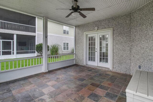 7272 Shellman Bluff Rd NE Unit 17, Townsend, GA 31331 - unfurnished sunroom with french doors and ceiling fan