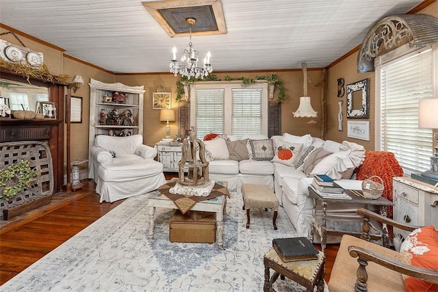 510 Bladen Rd, Brunswick, GA 31523 - living area with ornamental molding, a chandelier, wood finished floors, and a healthy amount of sunlight