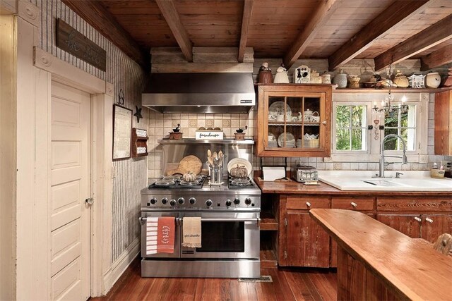 510 Bladen Rd, Brunswick, GA 31523 - kitchen featuring dark wood-style flooring, high end stainless steel range, wood ceiling, brown cabinets, and a sink