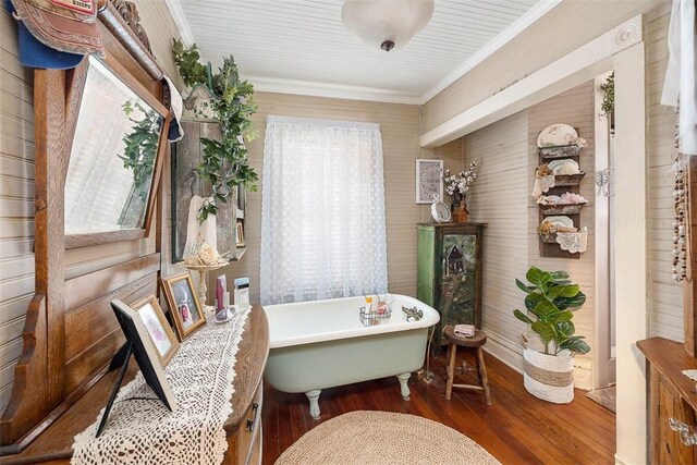 510 Bladen Rd, Brunswick, GA 31523 - dining space with ornamental molding, wood finished floors, and wooden walls
