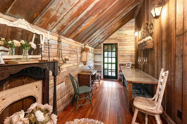 510 Bladen Rd, Brunswick, GA 31523 - interior space with hardwood / wood-style floors, wooden walls, and vaulted ceiling