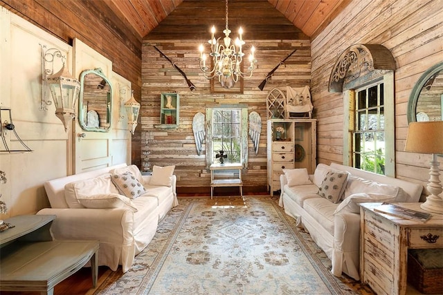 510 Bladen Rd, Brunswick, GA 31523 - living room featuring a notable chandelier, wood walls, wood ceiling, and lofted ceiling