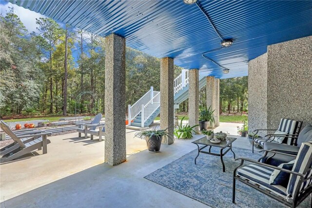 1068 Picnic Ln NE, Townsend, GA 31331 - view of patio / terrace with stairs