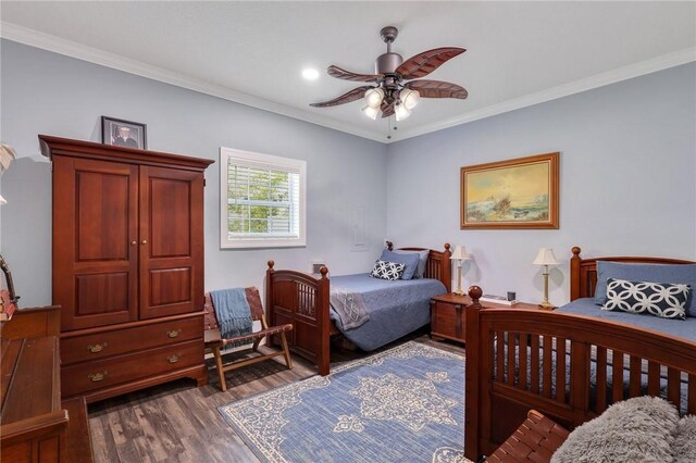 1068 Picnic Ln NE, Townsend, GA 31331 - bedroom with wood finished floors, a ceiling fan, and ornamental molding