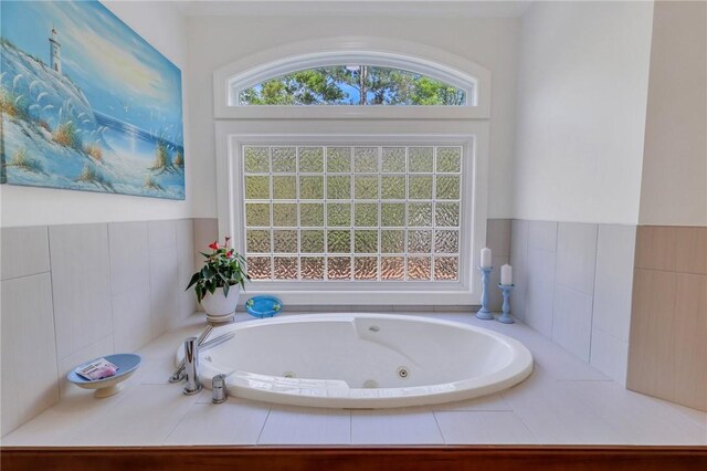 1068 Picnic Ln NE, Townsend, GA 31331 - bathroom with a jetted tub and plenty of natural light