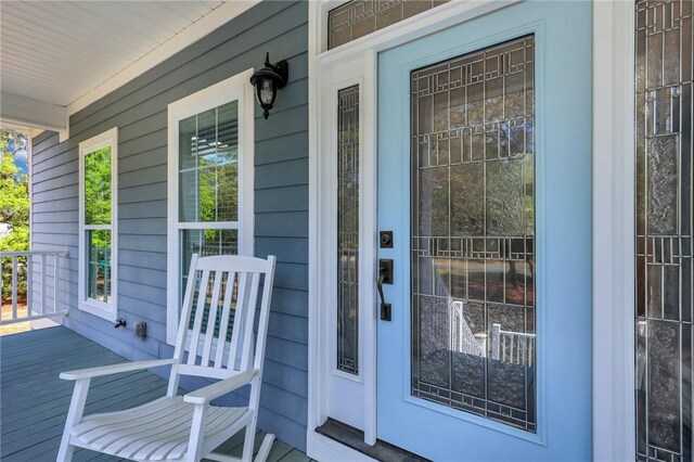 1068 Picnic Ln NE, Townsend, GA 31331 - view of exterior entry featuring a porch