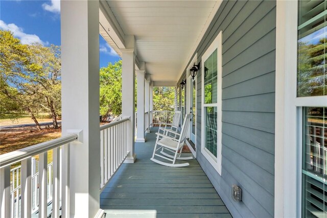 1068 Picnic Ln NE, Townsend, GA 31331 - balcony with covered porch