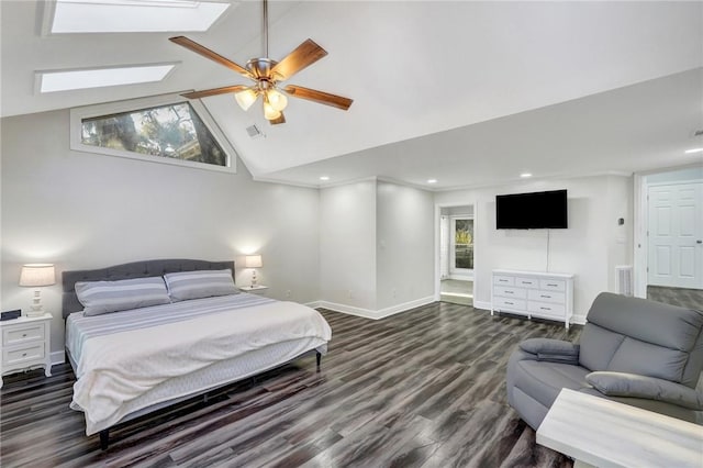 bedroom with ceiling fan, dark hardwood / wood-style flooring, a skylight, and high vaulted ceiling