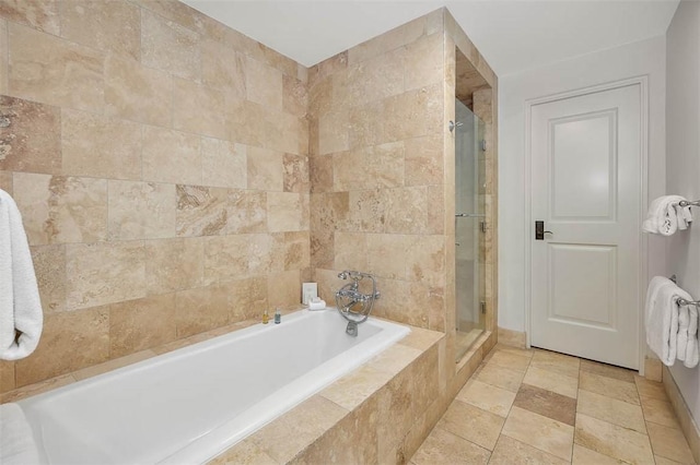 600 Beach Club Dr Unit 623/624, Sea Island, GA 31561 - bathroom featuring a shower stall and a garden tub