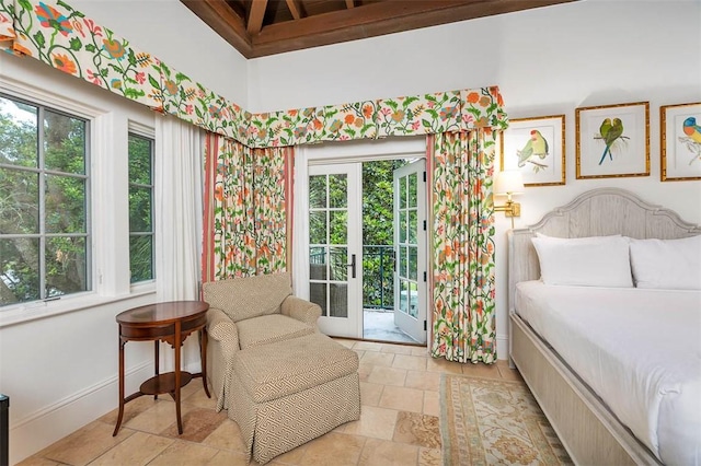 600 Beach Club Dr Unit 623/624, Sea Island, GA 31561 - bedroom featuring multiple windows, light stone finish flooring, and access to outside