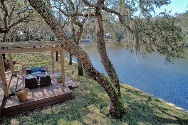 105 Driftwood Pl, Saint Simons Island, GA 31522 - view of green lawn with an outdoor living space and a deck with water view